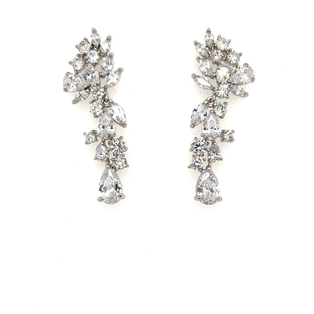 The Floral Vine Dangle Wedding Earrings (style no. E200) feature clusters of sparkling white gemstones in pear, marquise, and round cuts, arranged in a cascading floral design—perfect for dazzling bridal jewelry.