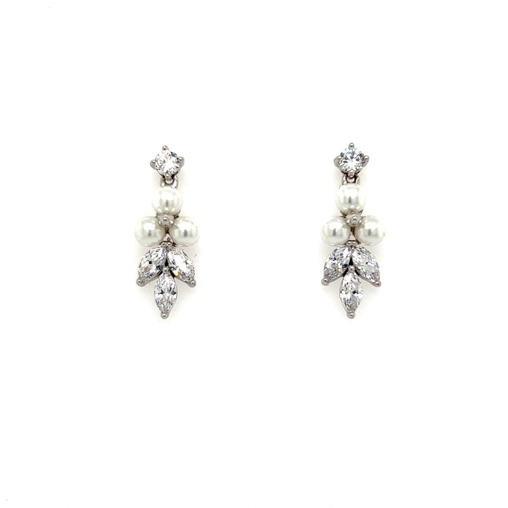 The Dainty CZ Drop Earrings (style no. E192) feature a round diamond, three pearls in the middle, and leaf-shaped diamonds below, shown on a white background. Perfect for enhancing any bridal jewelry collection with sophistication.