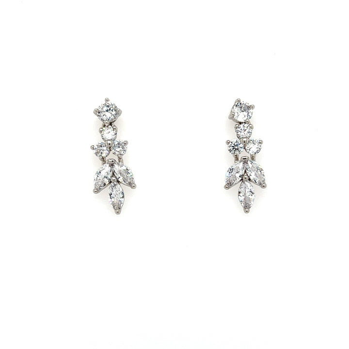 The Dainty CZ Drop Earrings (style no. E192) are perfect bridal jewelry, featuring square and marquise-shaped cubic zirconia crystals that cascade gracefully like elegant leaf earrings against a white background.