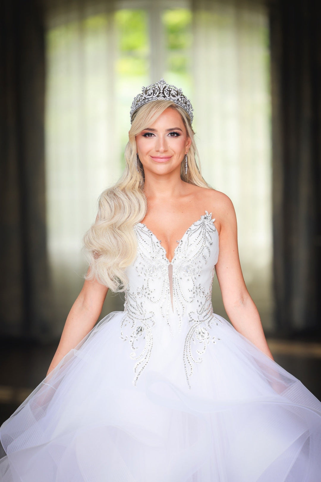 Real bride Erica wearing her custom Bridal Styles crystal tiara and sweetheart ball gown with crystal embroidery and organza skirt. 