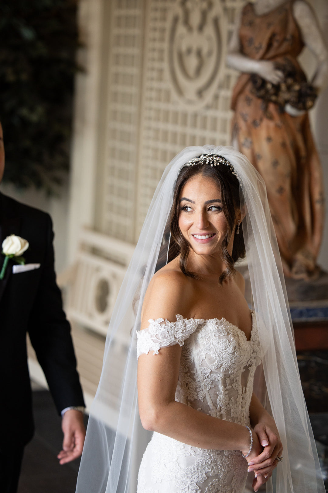 Real bride Jessica wearing Swarovski hair vine from Bridal Styles Boutique with cathedral veil and off-shoulder lace wedding dress