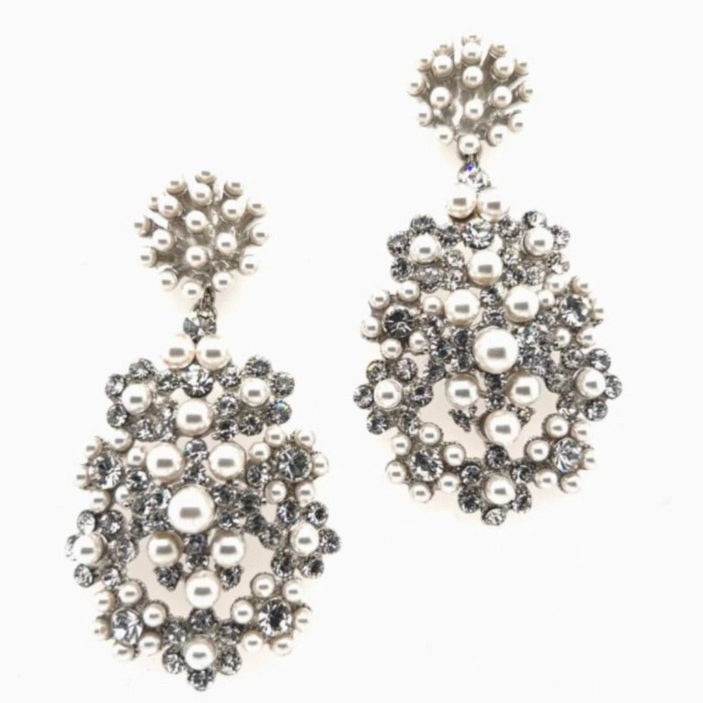 The Studded Pearl and Crystal Chandelier Earrings (style no. E218) feature clusters of pearls and crystals in floral patterns—perfect bridal statement jewelry for your special day.