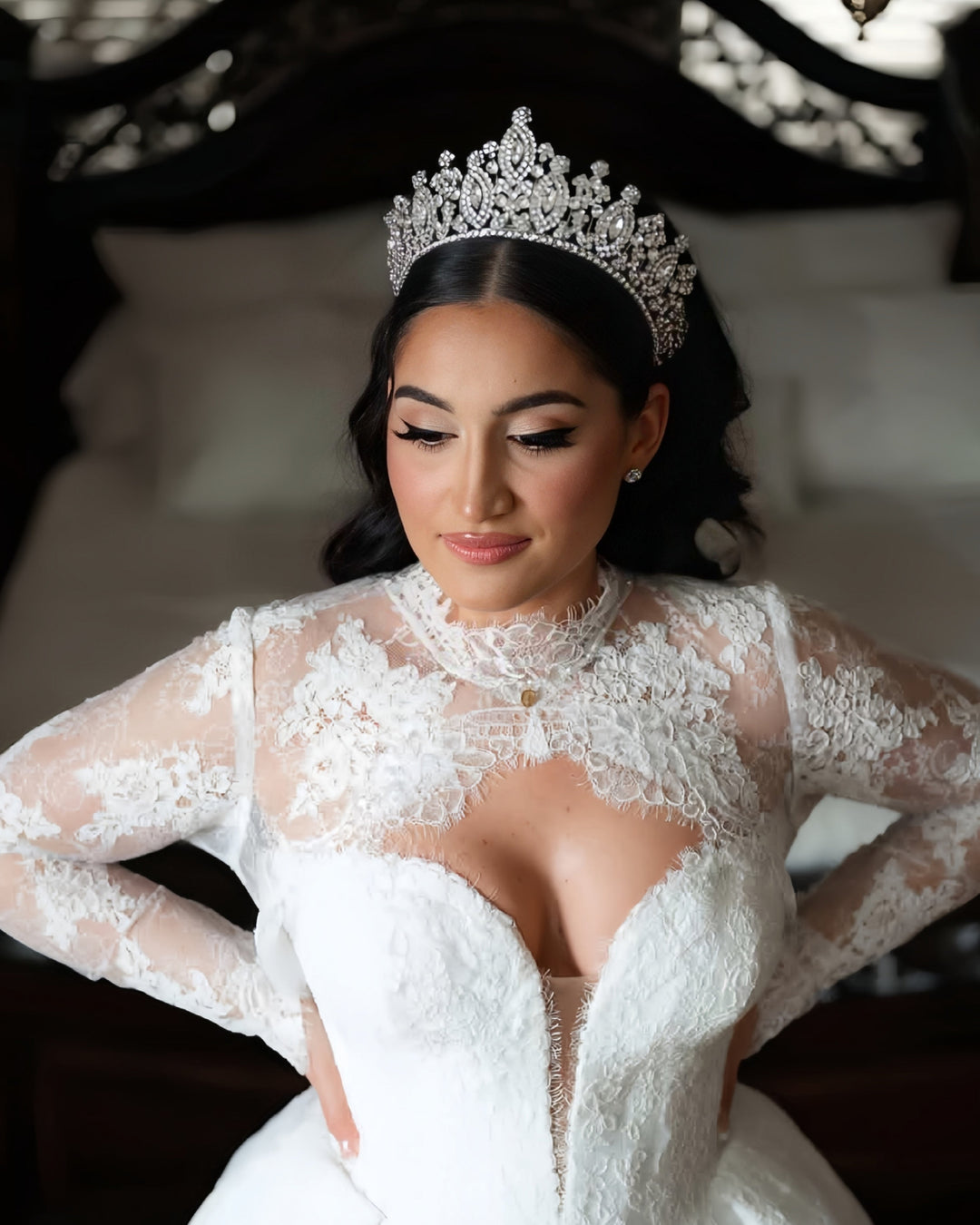 Beautiful dark hair bride looking very regal wearing Swarvoski crystal bridal tiara royal crown by Bridal Styles Boutique