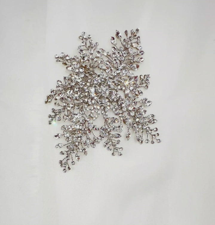 bridal hair comb with silver floral detailing and sparkling crystal sprays
