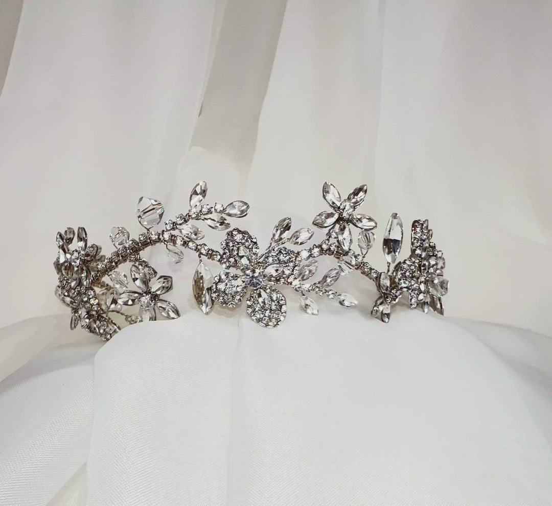 bridal headband with silver flowing branch and sparkling crystal flower details