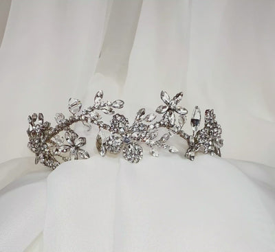 bridal headband with silver flowing branch and sparkling crystal flower details