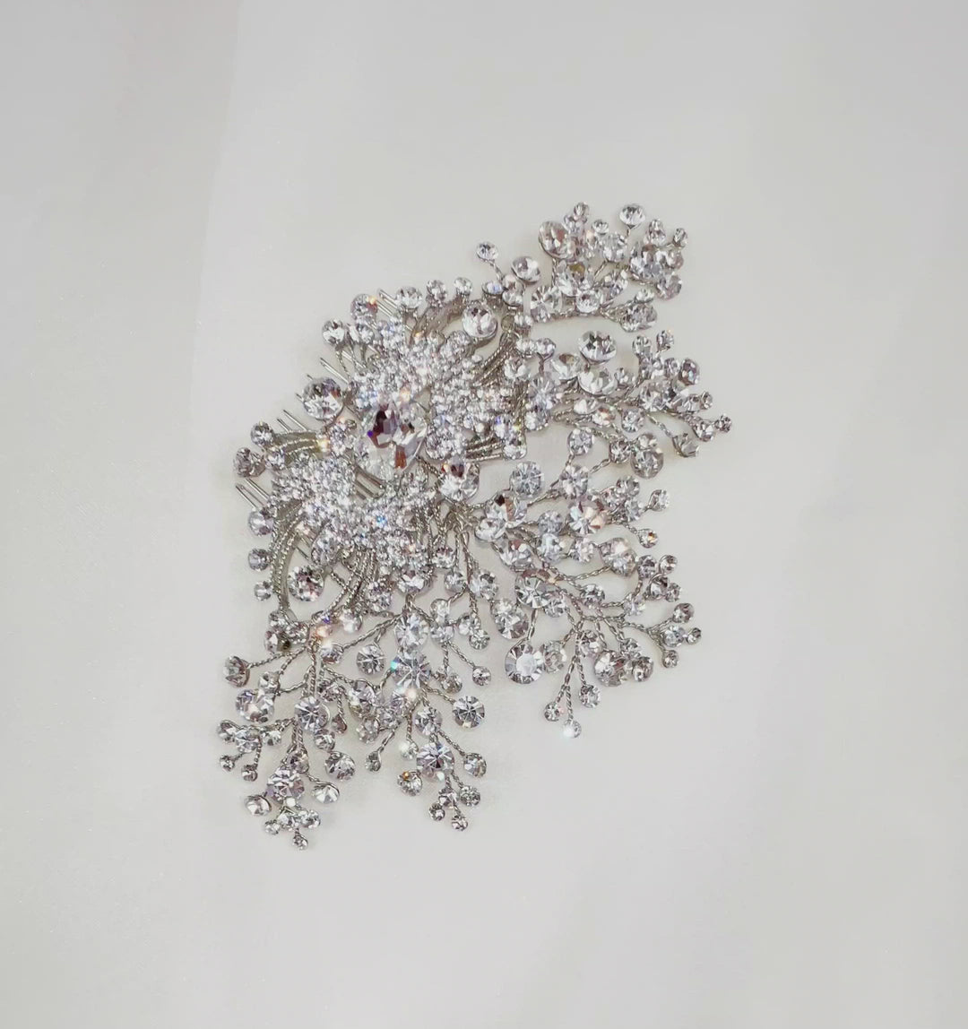 Glam crystal and  silver bridal hair comb with dazzling broach center surrounded by sparkling clusters and sprays