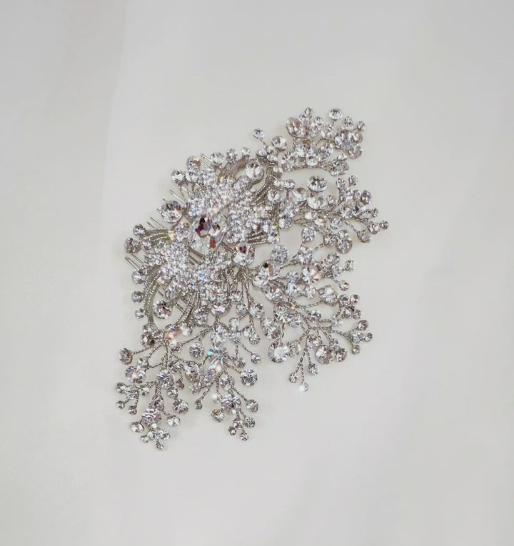 Glam crystal and  silver bridal hair comb with dazzling broach center surrounded by sparkling clusters and sprays