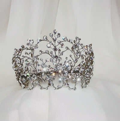 wide bridal headband with sparkling crystals on weaving silver sprigs