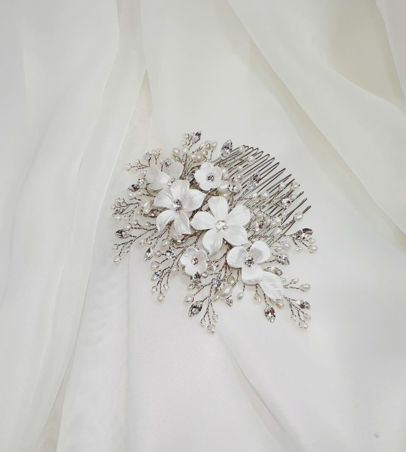 porcelain flower bridal hair comb with sparkling sprigs of crystals and pearls