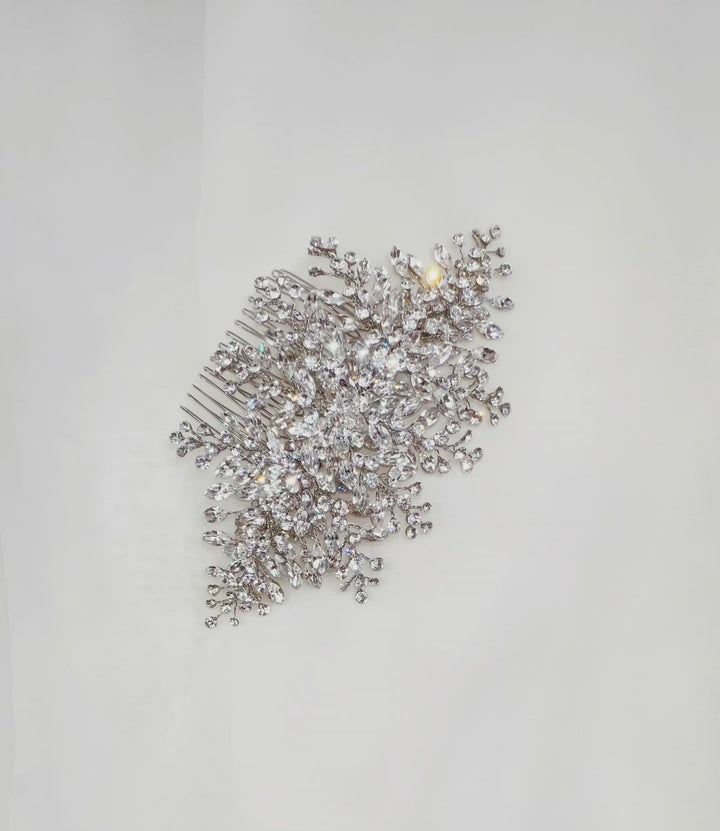 silver bridal hair comb with round cut sprays of crystal