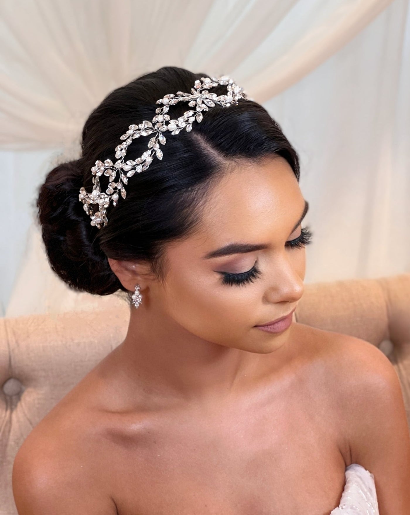 looping bridal hair vine with crystal and pearl on female model
