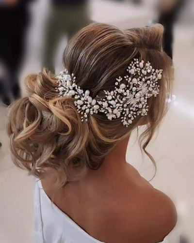 Freshwater pearl and Swarovski crystal bridal headpiece bridal vine on a blond bride