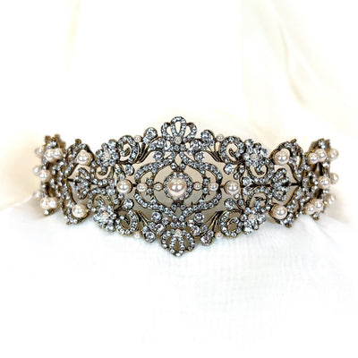 crystal bridal headband with vintage gold swirling details and pearl accents