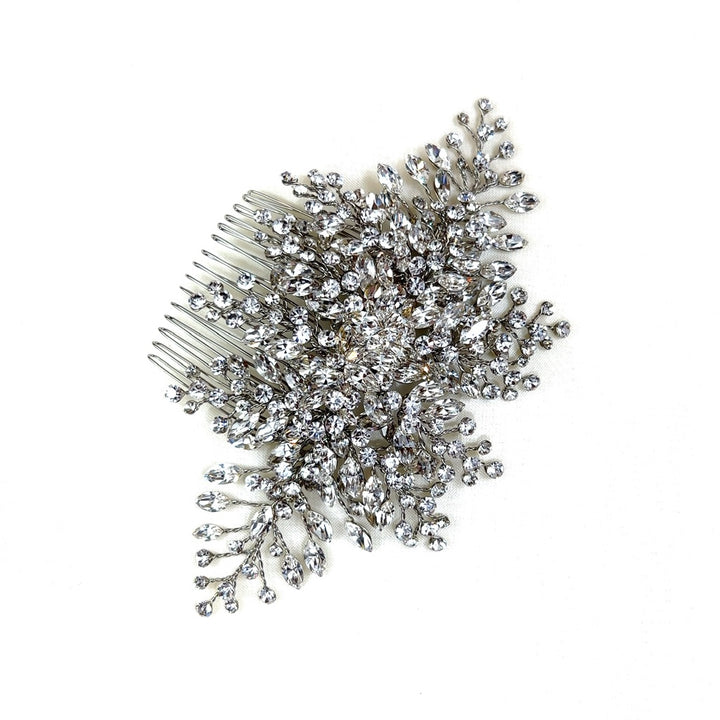 The Soft Crystal Cluster Comb (style no. 242588) is a Swarovski crystal bridal hair accessory featuring intricate sparkling embellishments arranged in a floral and branch-like design on a white background.