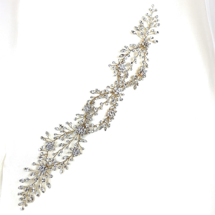 The Delicate Weaving Crystal Vine (style no. 242465) is a Swarovski crystal wedding hair accessory with intricate branch-like patterns. It is displayed against a plain white background.