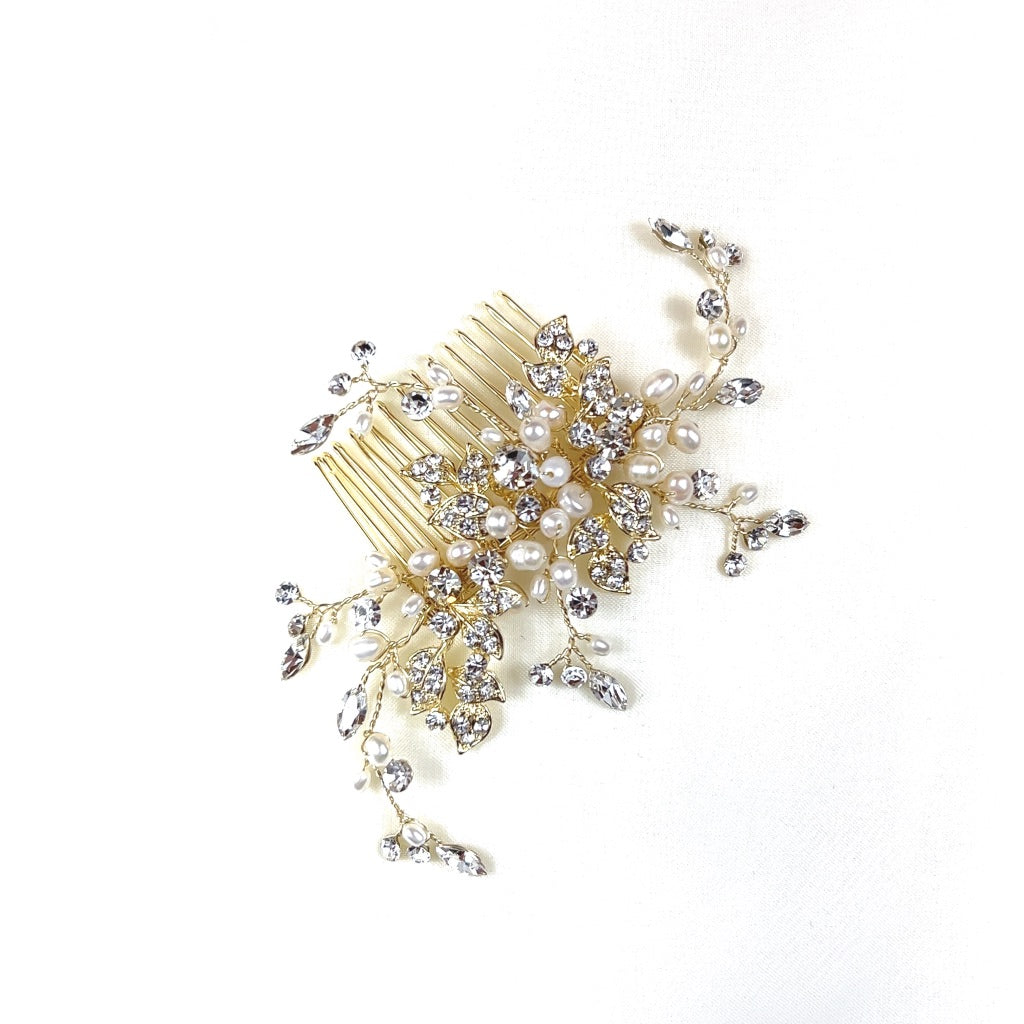 gold bridal hair comb with small encrusted leaves and curved sprigs of crystal and pearl