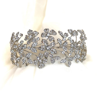 silver bridal headband with various flower details encrusted with round crystals