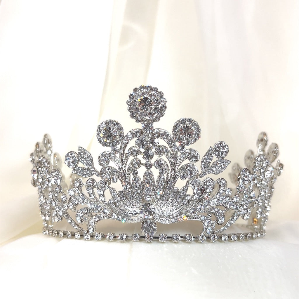 tall bridal tiara with swirling silver crystalized details and round crystal peaks