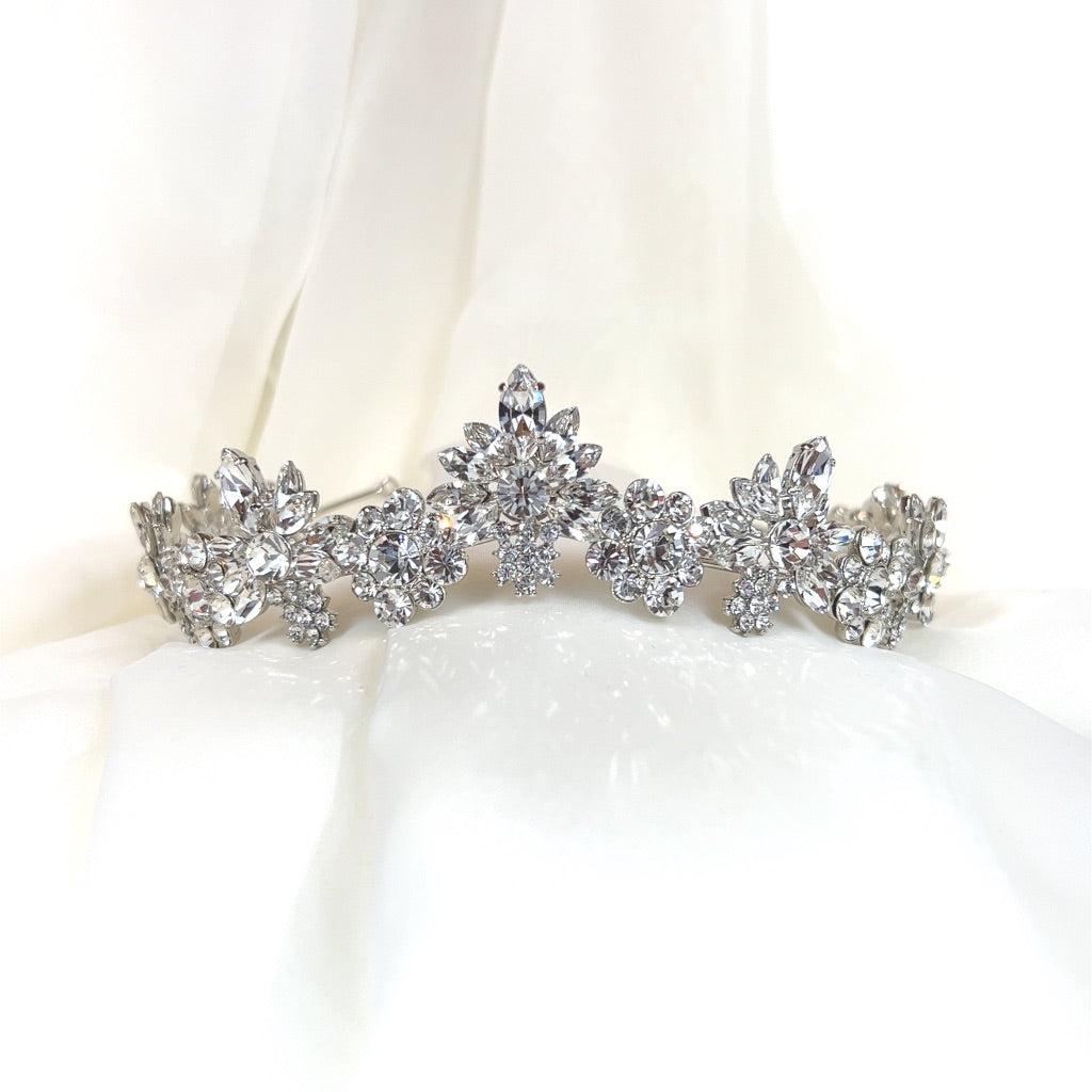 curved silver tiara of floral crystal clusters and peaks