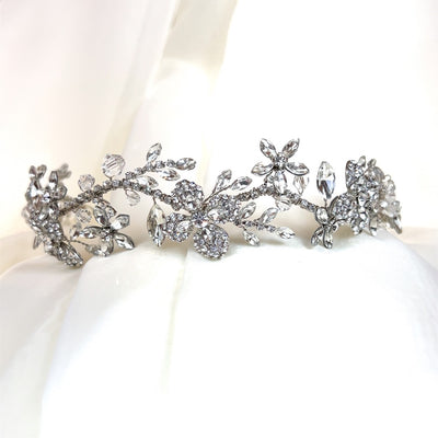 bridal headband with silver flowing branch and crystal flower details