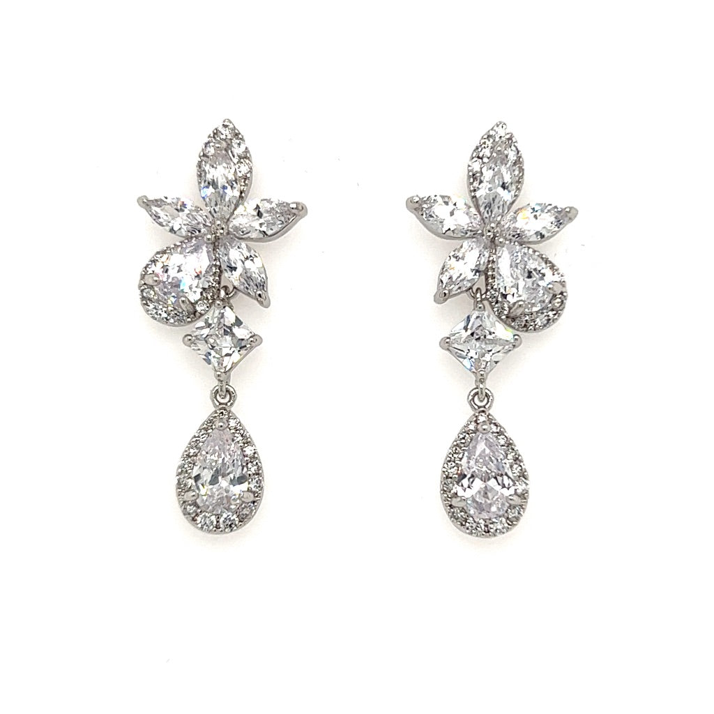 The Blossom CZ Drop Bridal Earrings (style no. E184) feature a cluster of marquise and round-cut AAA cubic zirconia with a teardrop-shaped drop, making them perfect as elegant bridal earrings.