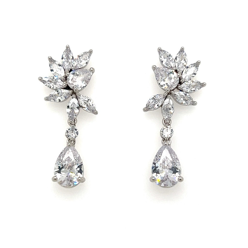 Accessorize with Romantic Cluster Drop Earrings (style no. E210), featuring a floral design with marquise-shaped stones and a teardrop pendant. Pair them with a Swarovski bridal tiara for an enchanting, elegant look.