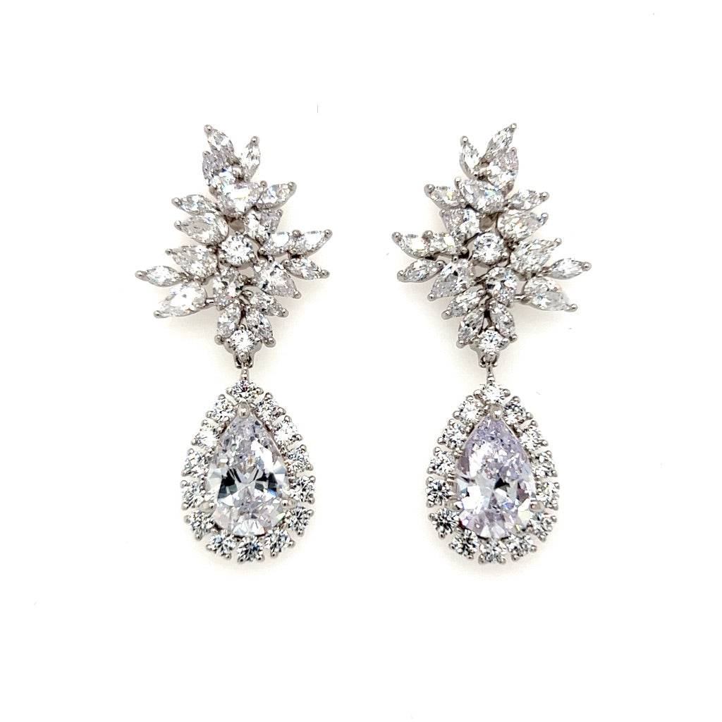 The Floral Teardrop Wedding Earrings (style no. E204) feature a cluster of marquise and round-cut stones at the top, with large teardrop Cubic Zirconia drops surrounded by smaller stones for an elegant bridal look.