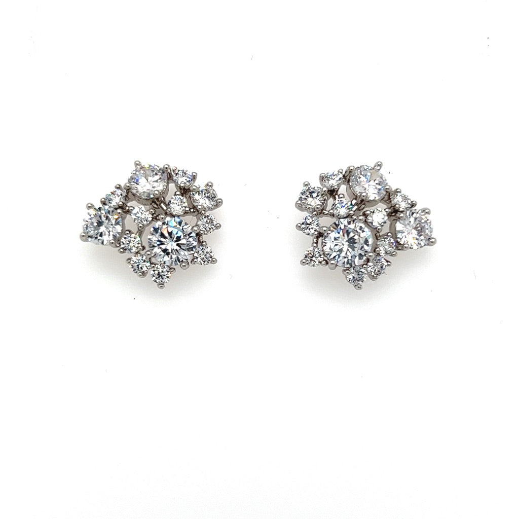 The Cluster Stud  CZ Bridal Earrings (style no. E194) feature a geometric arrangement of round, sparkling stones set in silver, making them perfect to pair with a dazzling Swarovski wedding crown for your special day.