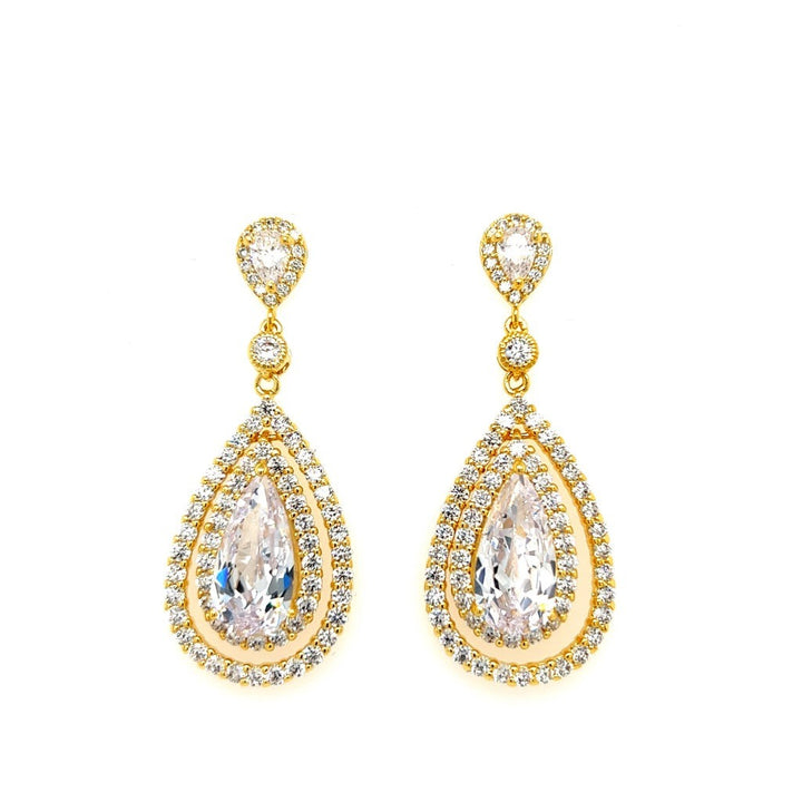 The Hollywood Glam Drop Earrings (style no. E205) feature large teardrop clear gemstones accented by two rows of round diamonds and a smaller teardrop diamond on top—ideal as bridal or wedding jewelry.