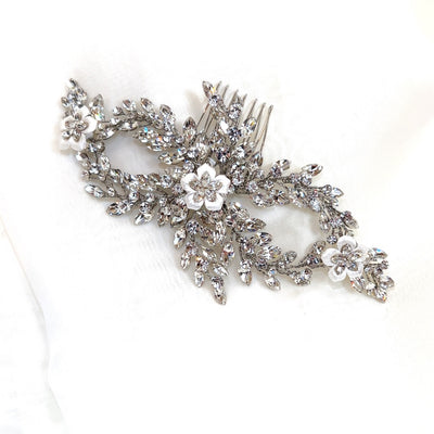 bridal hair comb with swirling double loop crystal sprigs and small porcelain flowers