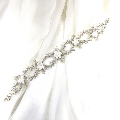 thin looping bridal hair vine with small pearl and crystal details and white porcelain flowers
