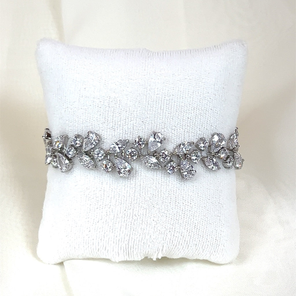 bridal cluster bracelet with teardrop and round cut cubic zirconia with silver detailing
