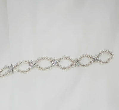 bridal looping pearl hair vine with sparkling silver flower details