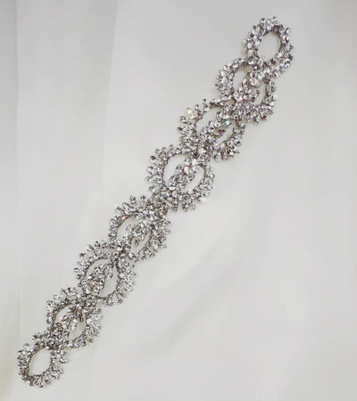 silver bridal hair vine with rounded loops of crystals