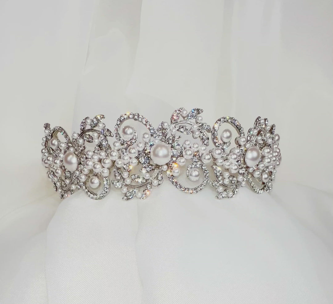 silver bridal headband with crystalized swirl details and pearl clusters