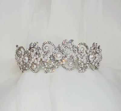 silver bridal headband with crystalized swirl details and pearl clusters