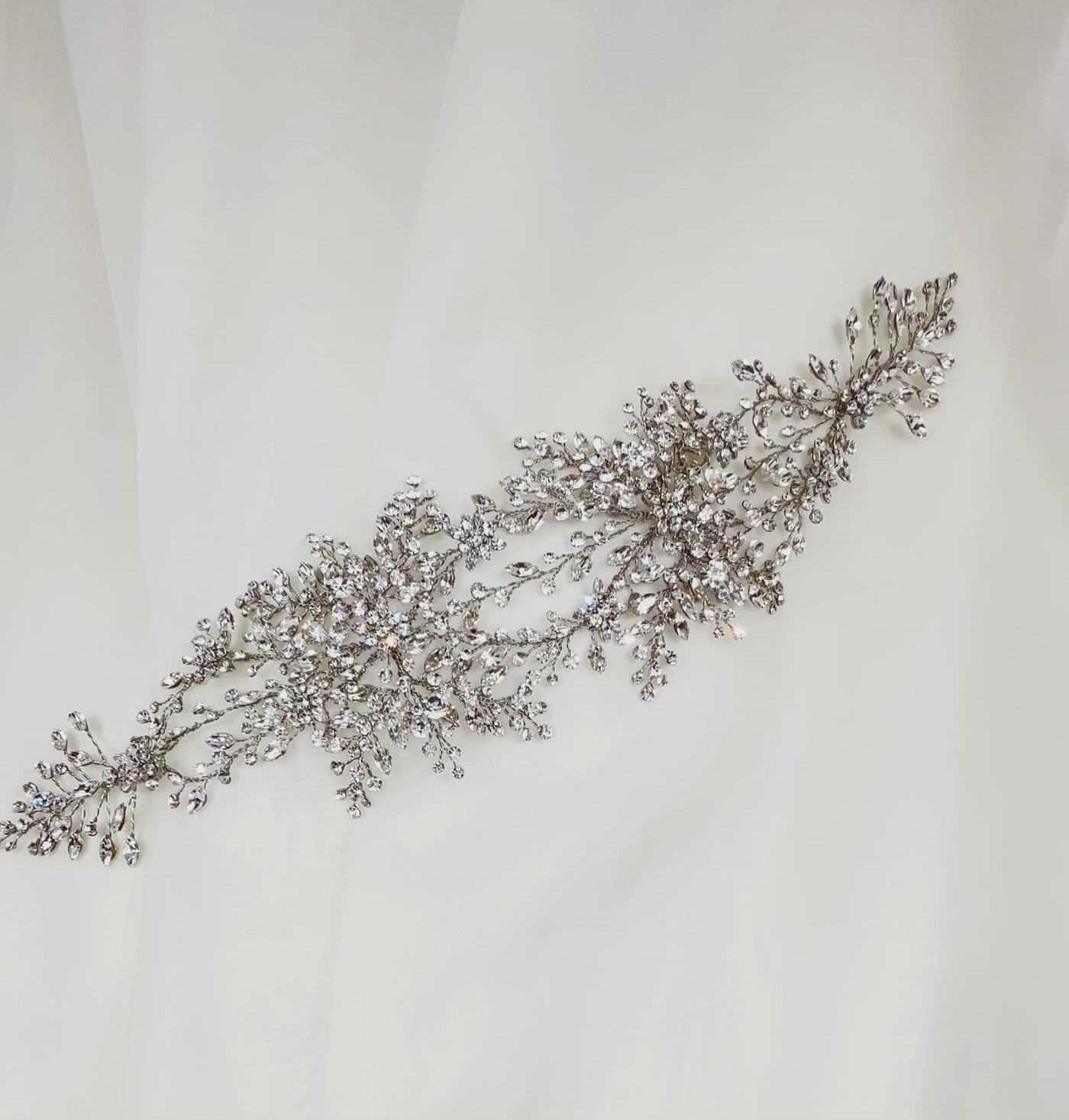 wide bridal hair vine with silver crystal sprigs and sparkling floral details
